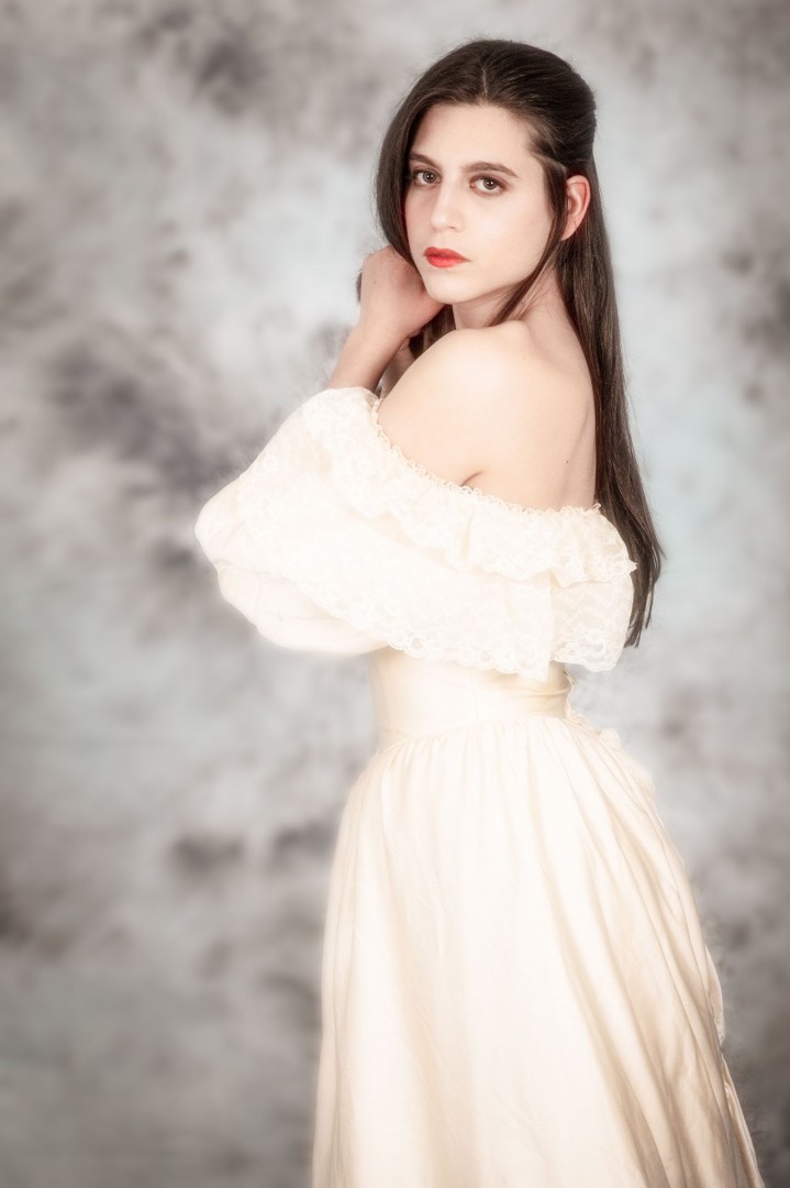 studio portrait, with fine white dress